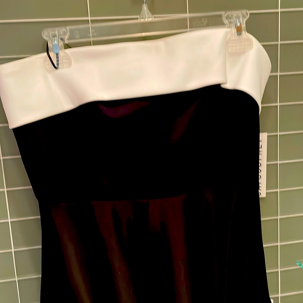 Perfect for New Year’s Eve. Strapless tuxedo style dress.